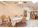 Bright dining room features vaulted ceiling, skylight, and wood-look vinyl plank flooring at 134 Deskin Dr, South Daytona, FL 32119