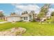 Charming single-story home with lush lawn and well-maintained landscaping at 134 Deskin Dr, South Daytona, FL 32119