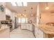 Bright and airy kitchen with white cabinets, granite countertops, and stainless steel appliances at 134 Deskin Dr, South Daytona, FL 32119