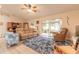 Cozy living room with large sliding glass doors leading to the lanai at 134 Deskin Dr, South Daytona, FL 32119