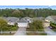 Charming single-Gathering home with a well-manicured lawn and brick-paved driveway at 1341 Hayton Ave, Deland, FL 32724