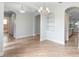 Spacious living room with wood floors, arched doorways, recessed lights, and an open floor plan at 1341 Hayton Ave, Deland, FL 32724