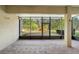 The screened patio provides an excellent view of the garden and lush backyard at 1341 Hayton Ave, Deland, FL 32724