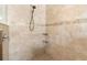 Shower features tile walls, mosaic accents, corner shelves, and a rainfall shower head at 1341 Hayton Ave, Deland, FL 32724