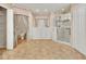 Well-lit bathroom featuring a walk-in tub, separate shower, tile floor and ample storage space at 1491 W Silver Hammock, Deland, FL 32720