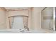 Elegant bathtub and separate shower, surrounded by neutral walls and trim and floral accents at 1491 W Silver Hammock, Deland, FL 32720