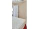 Bed in bedroom featuring dual closets, complemented by soft carpet flooring, and a ceiling fan for added comfort and storage at 1491 W Silver Hammock, Deland, FL 32720