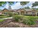 Beautiful home with a meticulously landscaped front yard and a stone-accented facade at 1491 W Silver Hammock, Deland, FL 32720