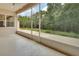 Large screened porch offers a tranquil outdoor living space with peaceful views at 1491 W Silver Hammock, Deland, FL 32720