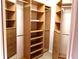 Neatly arranged walk-in closet with ample shelves, drawers, and hanging space for storage and organization at 1491 W Silver Hammock, Deland, FL 32720