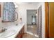Bathroom boasts double sink vanity with generous countertop space and a wood cabinet at 1712 Alanson Dr, Deland, FL 32724