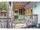 Screened porch with wood floors and ceiling and adjacent gazebo offers backyard views at 1712 Alanson Dr, Deland, FL 32724
