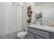 Bathroom featuring seahorse decor and a white quartz countertop at 1716 Red Rock Rd, New Smyrna Beach, FL 32168