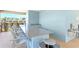 Community bar area featuring granite counters, seating and adjacent drinking fountains at 1716 Red Rock Rd, New Smyrna Beach, FL 32168