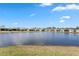 Wonderful view of the tranquil lake from the backyard of the property at 1716 Red Rock Rd, New Smyrna Beach, FL 32168