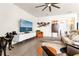 Bright and airy living room featuring neutral tones, modern decor, and a view into the rest of the home at 1716 Red Rock Rd, New Smyrna Beach, FL 32168