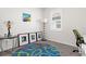 Office featuring a comfortable green chair and colorful decor at 1716 Red Rock Rd, New Smyrna Beach, FL 32168
