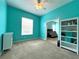 Spacious bedroom with blue walls and carpeted floor at 1751 Creekwater Blvd, Port Orange, FL 32128