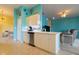 Modern kitchen featuring white cabinets, stainless steel appliances, and an open layout at 1751 Creekwater Blvd, Port Orange, FL 32128