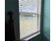 Close up of window overlooking the backyard featuring a pond at 1751 Creekwater Blvd, Port Orange, FL 32128