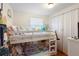 Bright bedroom featuring a bunk bed, complemented by fun decor and natural light at 1930 S Clara Ave, Deland, FL 32720