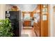 Compact kitchen featuring wood cabinets and stainless steel appliances at 1930 S Clara Ave, Deland, FL 32720