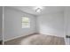 Cozy bedroom with wood floors and ample natural light at 1986 Big Oak Dr, South Daytona, FL 32119