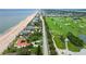 Spectacular oceanfront property next to golf course featuring a luxurious home, combining coastal living and leisure at 201 Ocean Shore Blvd, Ormond Beach, FL 32176