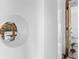 Architectural detail of the circular window and hallway at 201 Ocean Shore Blvd, Ormond Beach, FL 32176