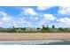 Expansive beachfront estate featuring a luxurious home with stunning ocean views and lush landscaping at 201 Ocean Shore Blvd, Ormond Beach, FL 32176