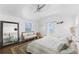 Comfortable bedroom featuring a plush bed, daybed, and serene ocean view at 201 Ocean Shore Blvd, Ormond Beach, FL 32176