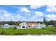 An expansive lawn surrounds the beautiful home with a gazebo and ocean views at 201 Ocean Shore Blvd, Ormond Beach, FL 32176