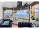 Bright living room with terracotta tile and ocean view; plants add freshness to the cozy, inviting space at 201 Ocean Shore Blvd, Ormond Beach, FL 32176