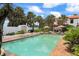 Beautiful pool with lush landscaping, lounge seating, and tranquil ambiance at 201 Ocean Shore Blvd, Ormond Beach, FL 32176