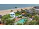 A beautiful pool and beachfront gazebo overlook the ocean at 201 Ocean Shore Blvd, Ormond Beach, FL 32176