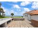 Large roof deck with marble counters, pizza oven, and unobstructed ocean views at 201 Ocean Shore Blvd, Ormond Beach, FL 32176