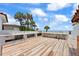 Expansive roof deck with marble counters, wood-look tile, and stunning ocean views at 201 Ocean Shore Blvd, Ormond Beach, FL 32176