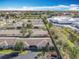 Aerial view of the homes surrounded by trees and greenery in the community at 202 Oakleigh Dr # 90, Deland, FL 32724