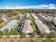 Rows of single story homes, surrounded by mature trees, show the beauty of the community at 202 Oakleigh Dr # 90, Deland, FL 32724