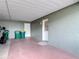 Carport with covered parking space and utility storage with secure entrance door at 202 Oakleigh Dr # 90, Deland, FL 32724