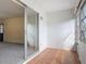 Enclosed lanai featuring tile flooring, textured walls, and sliding glass door at 202 Oakleigh Dr # 90, Deland, FL 32724
