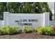 Entrance sign for Towns at Lake Monroe at Commons community at 206 Beautyberry Ln, Sanford, FL 32771