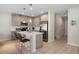 Stylish kitchen with stainless steel appliances and white tile backsplash at 206 Beautyberry Ln, Sanford, FL 32771