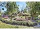 Well-landscaped community sign and entrance for Blue Spring Landing homes at 230 White Dove Ave, Orange City, FL 32763