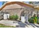 Exterior view with generator and propane tanks at 230 White Dove Ave, Orange City, FL 32763