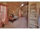 Sauna space featuring wood paneling, brick floors, and skylight at 230 White Dove Ave, Orange City, FL 32763