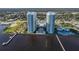 An aerial view showcases the two buildings, along with the pool, recreational facilities, and waterfront at 231 Riverside Dr # 1801-1, Daytona Beach, FL 32117