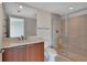 Modern bathroom with glass shower and granite countertops at 231 Riverside Dr # 1801-1, Daytona Beach, FL 32117