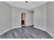 Bedroom with wood flooring and en suite bathroom at 231 Riverside Dr # 1801-1, Daytona Beach, FL 32117