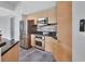 Modern kitchen featuring stainless steel appliances and stylish cabinetry at 231 Riverside Dr # 1801-1, Daytona Beach, FL 32117